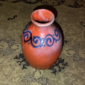 Handcrafted Orange Vase with Blue Swirl Design